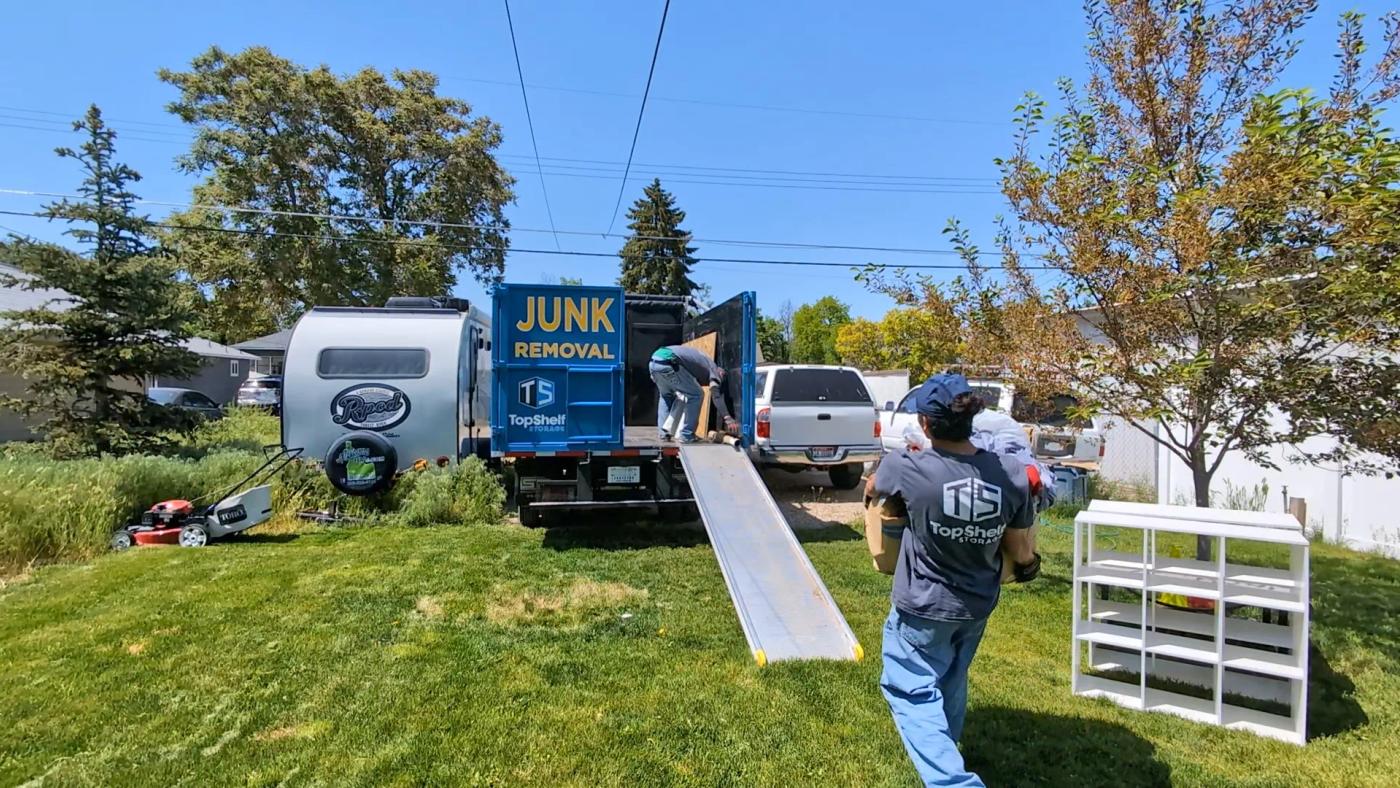 Crew removing furniture during a downsizing project in Eagle Idaho