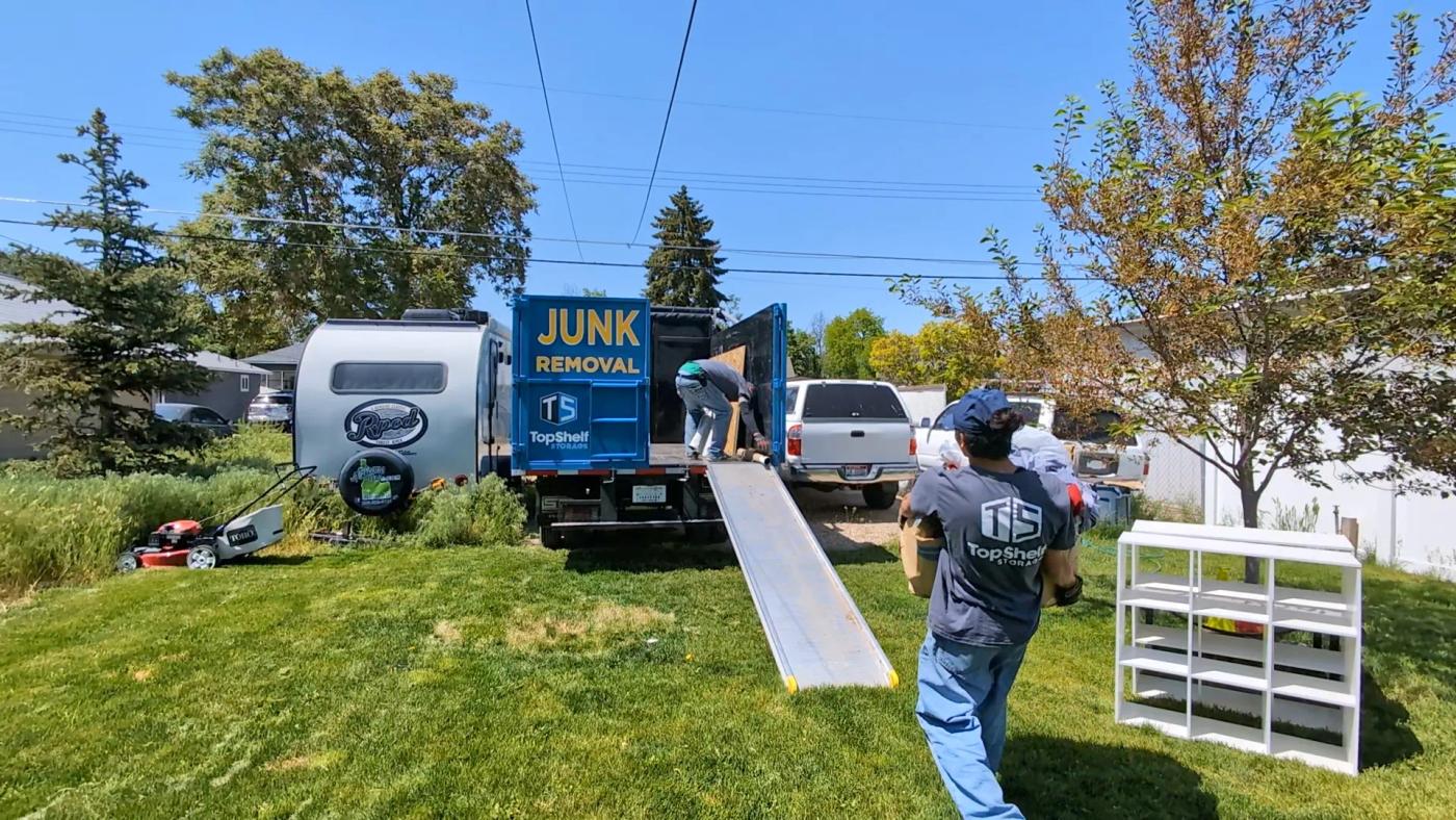 Crew removing furniture during a downsizing project in Eagle Idaho