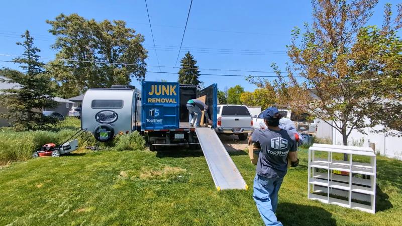 Crew removing furniture during a downsizing project in Eagle Idaho