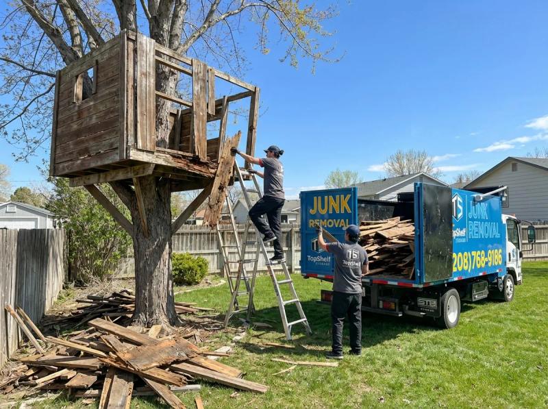 Professional tree fort demolition and debris removal by Top Shelf crew in Kuna Idaho