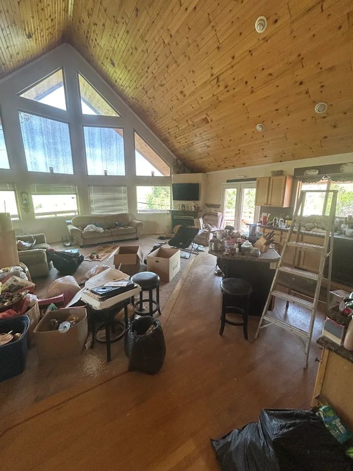 Belongings sorted into keep, donate and haul piles during a cleanout