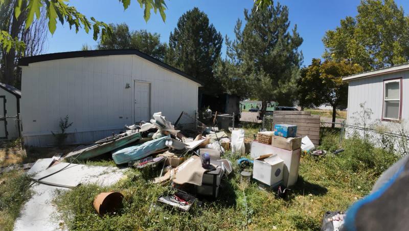 Yard debris during a property cleanout by Top Shelf in Star Idaho