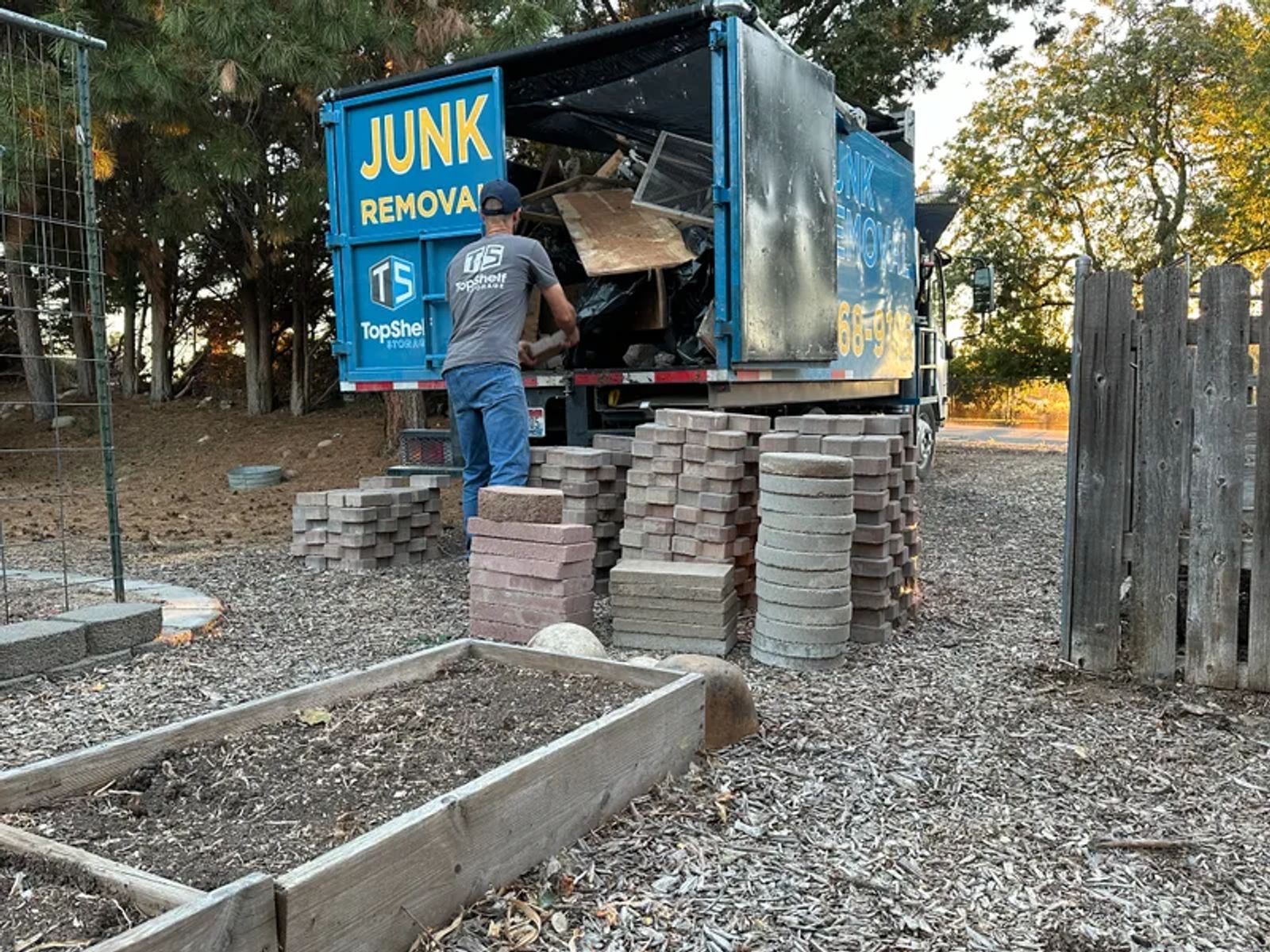 Top Shelf branded truck loaded with pavers during removal in Star Idaho