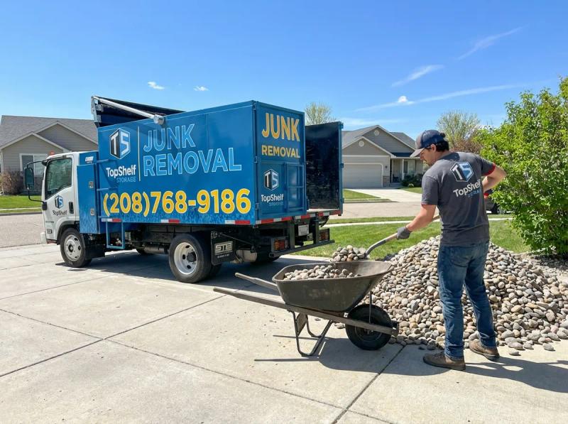 Top Shelf crew removing rocks and boulders from a residential property in Boise Idaho
