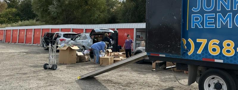 Top Shelf crew loading items from a self-storage unit