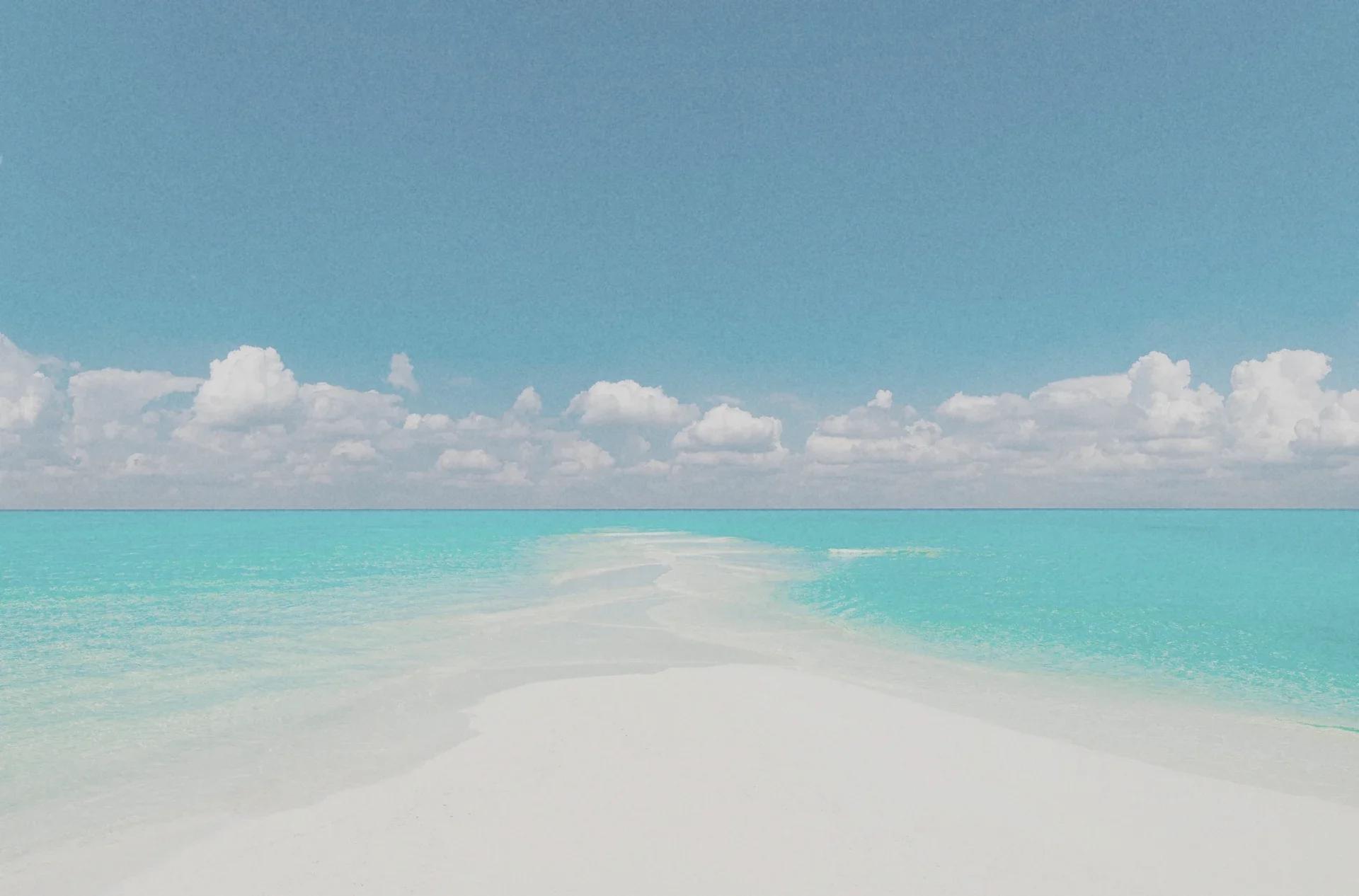 An overwater villa on a Maldivian atoll at first light