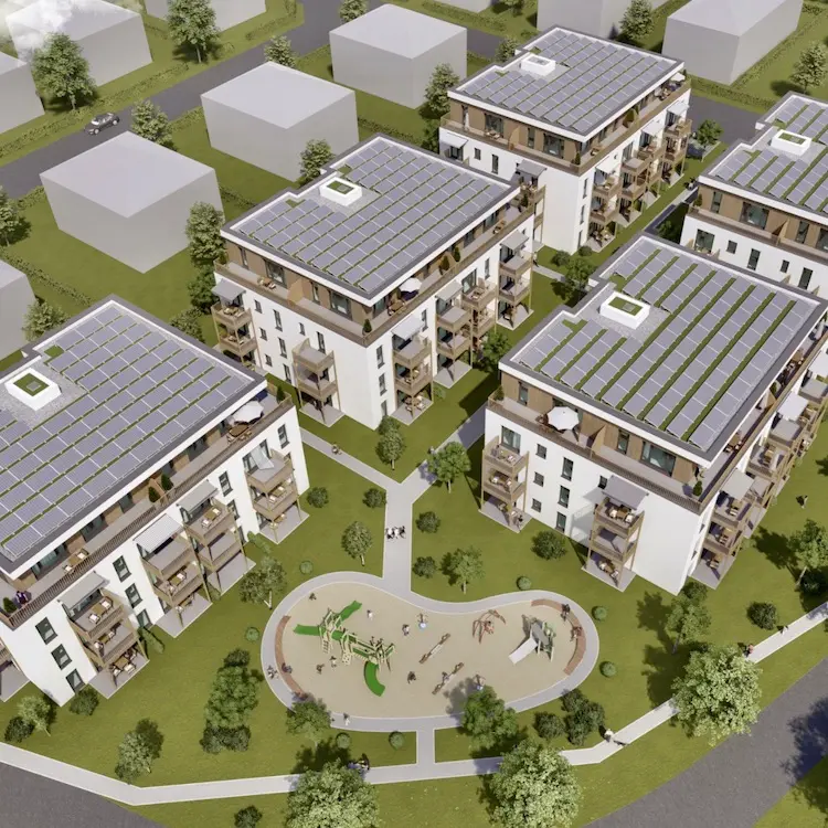 Vogelperspektive auf Siedlung mit PV-Dächern