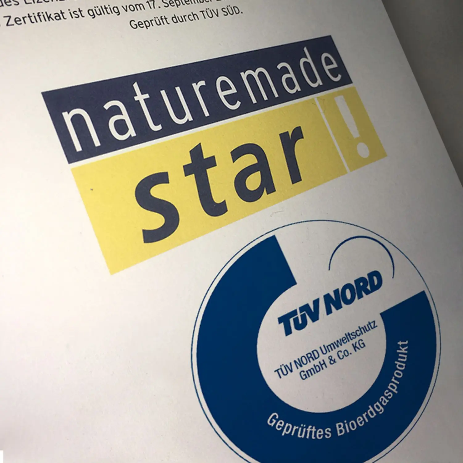Ökogassiegel Naturemade Star und TÜV Nord