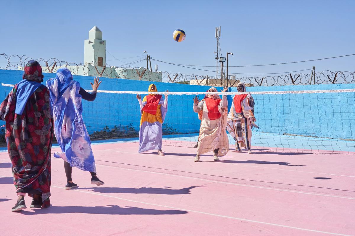 Women playing volleyball at the Safria Center in Mauritania