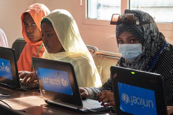 Women in Nouakchott, Mauritania work on laptops