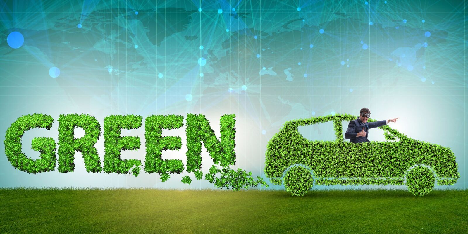 Illustration of a car made of green leaves on grass