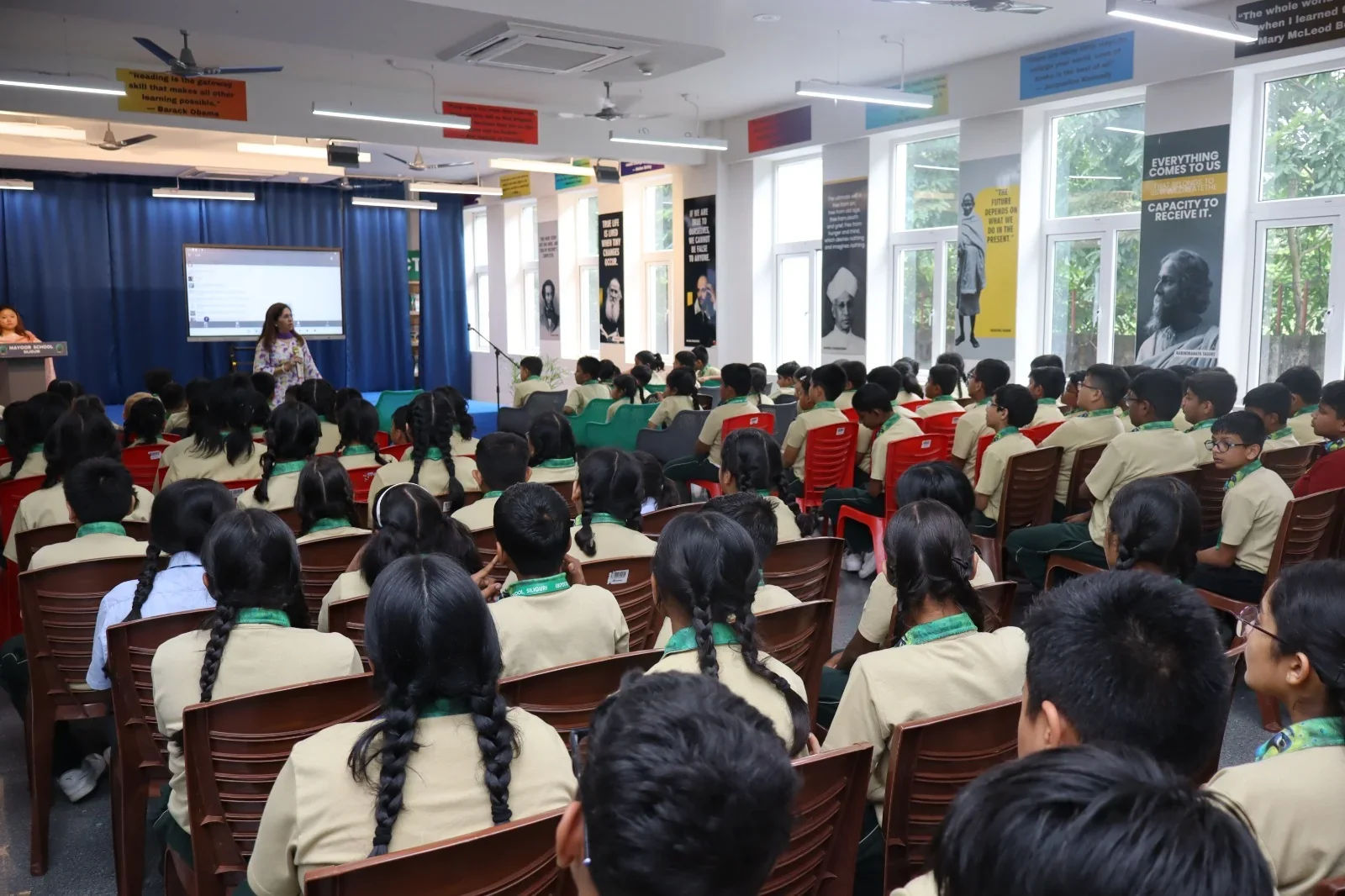 Community gathering in the auditorium