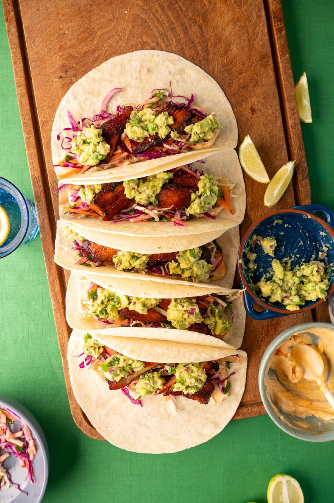 Tacos being shared around the table