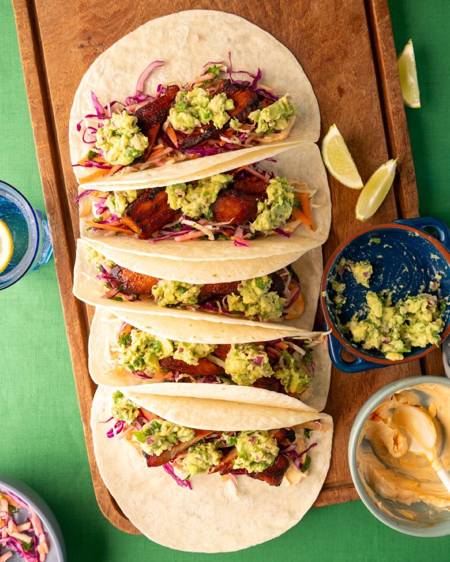 Tacos being shared around the table