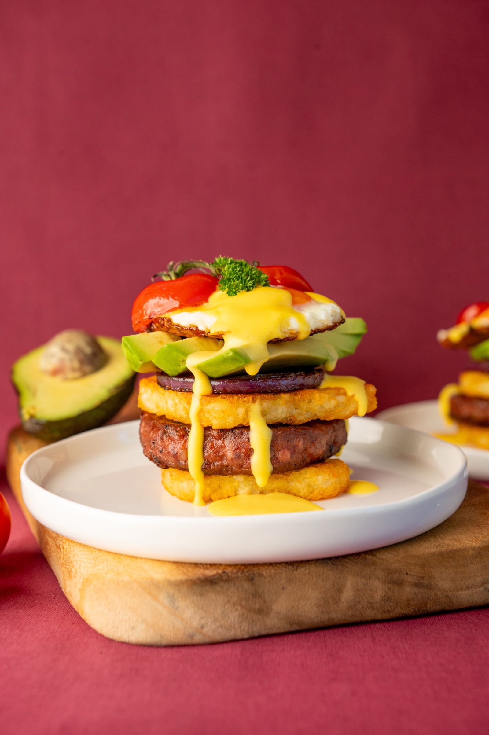 Beef breakfast stack topped with a fried egg