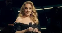 Adele meets her teacher onstage!