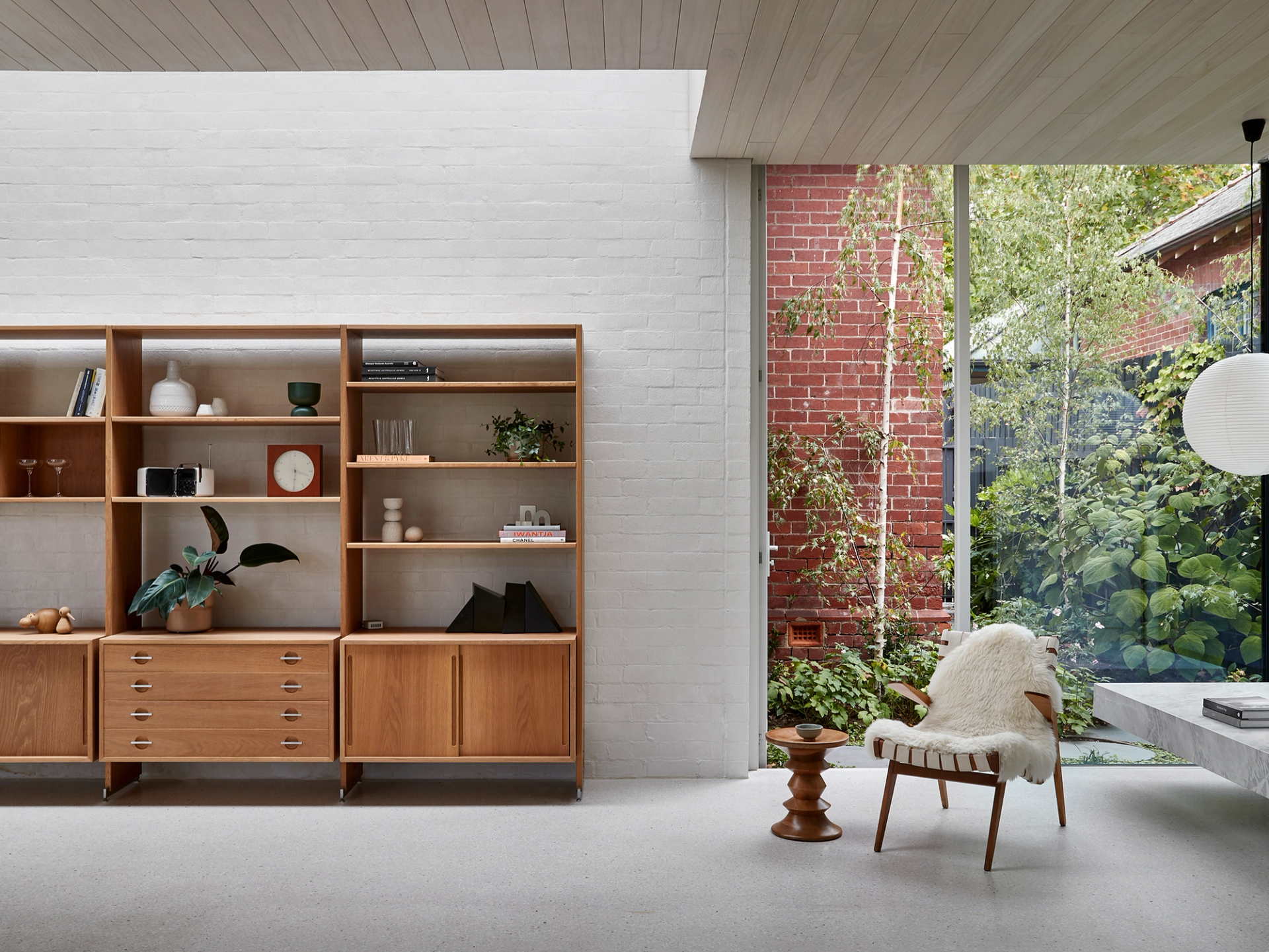 Full-height windows on both sides of the extension allow for year-round light and garden views.