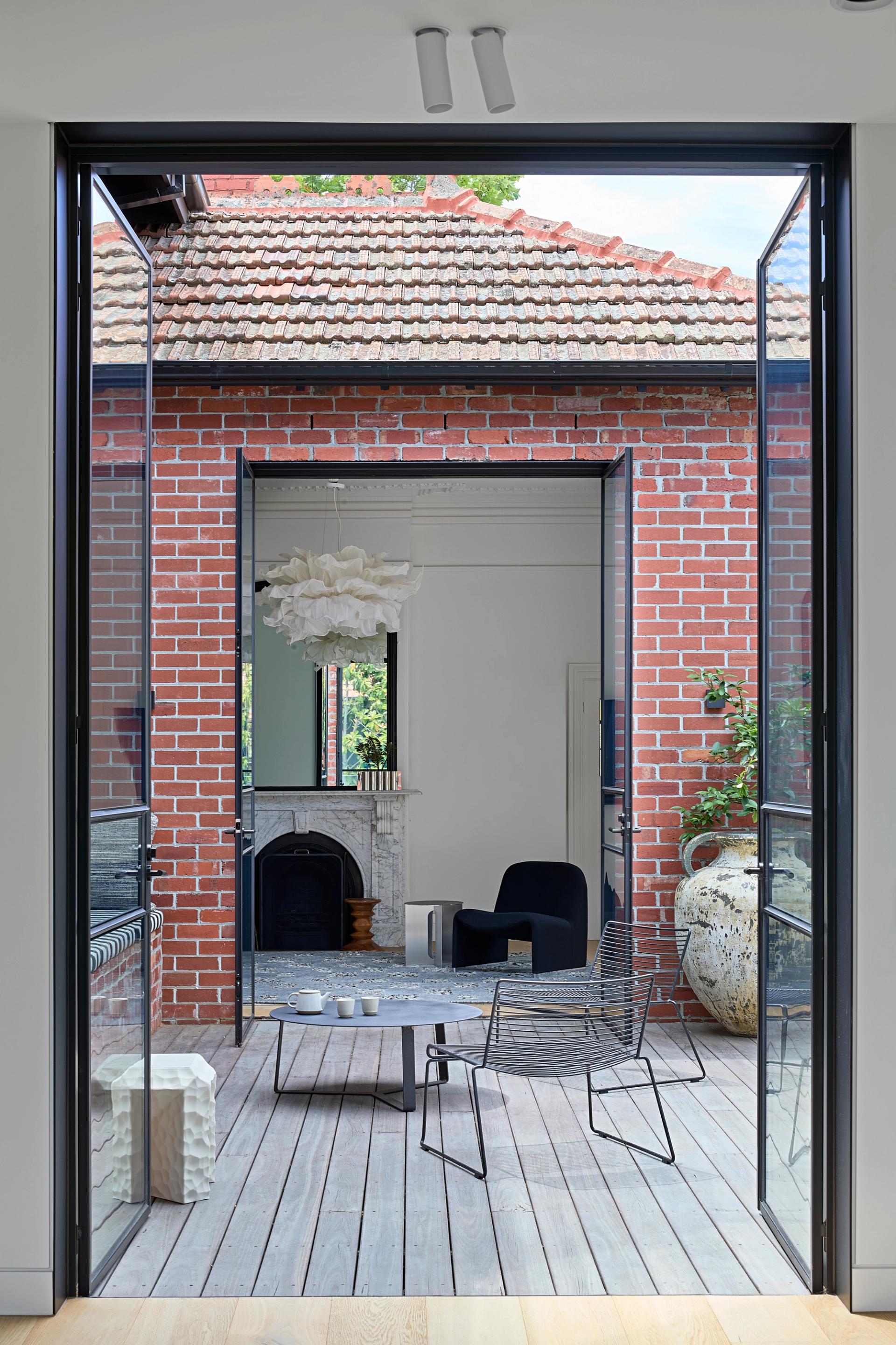 A centrally located courtyard floods the space with natural light.