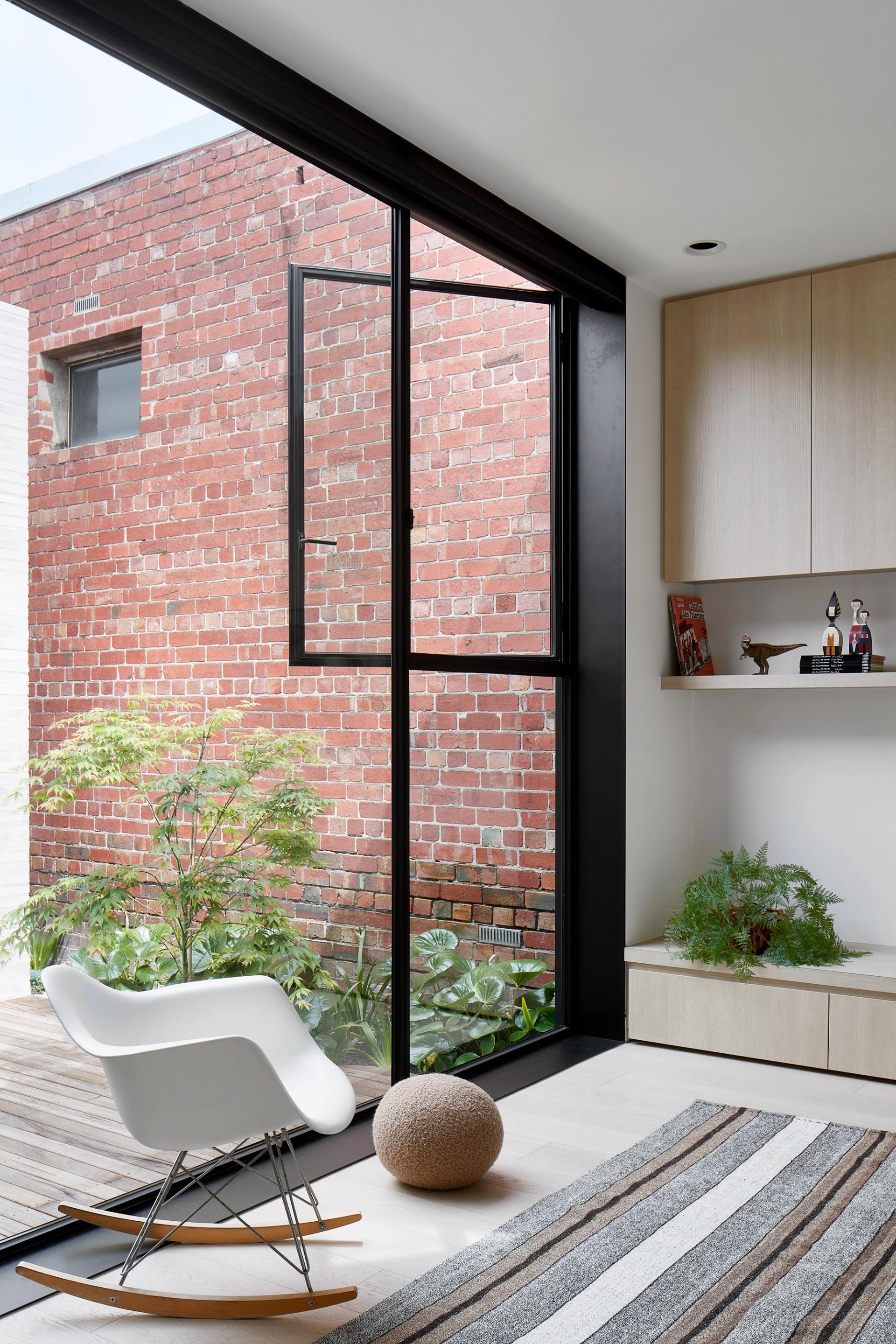 The courtyard provides a natural backdrop to the living room.