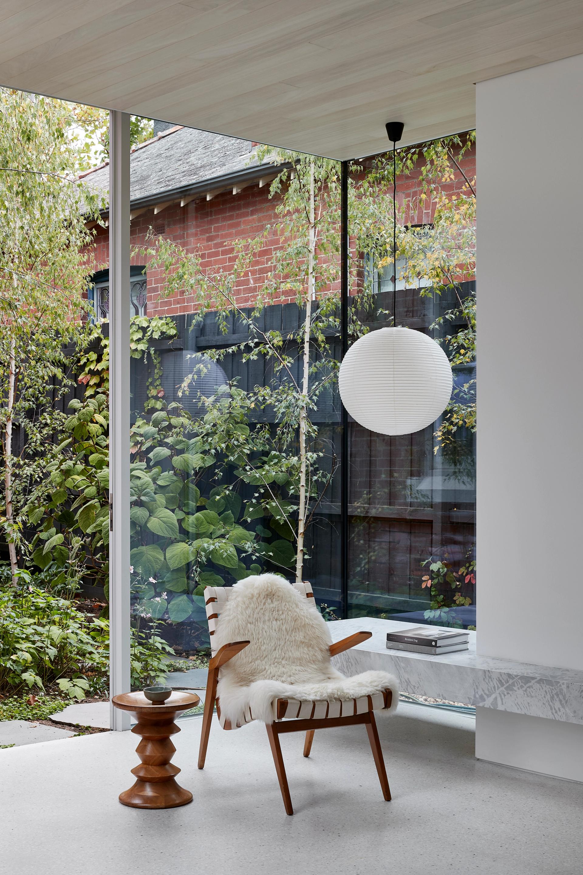 Full-height glazing to both sides of the extension bringing light and garden views
