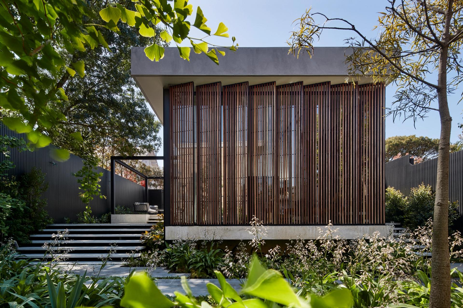 Hidden House’s full-height screens are a feature that can open the living spaces to the garden or shield harsh afternoon sun.
