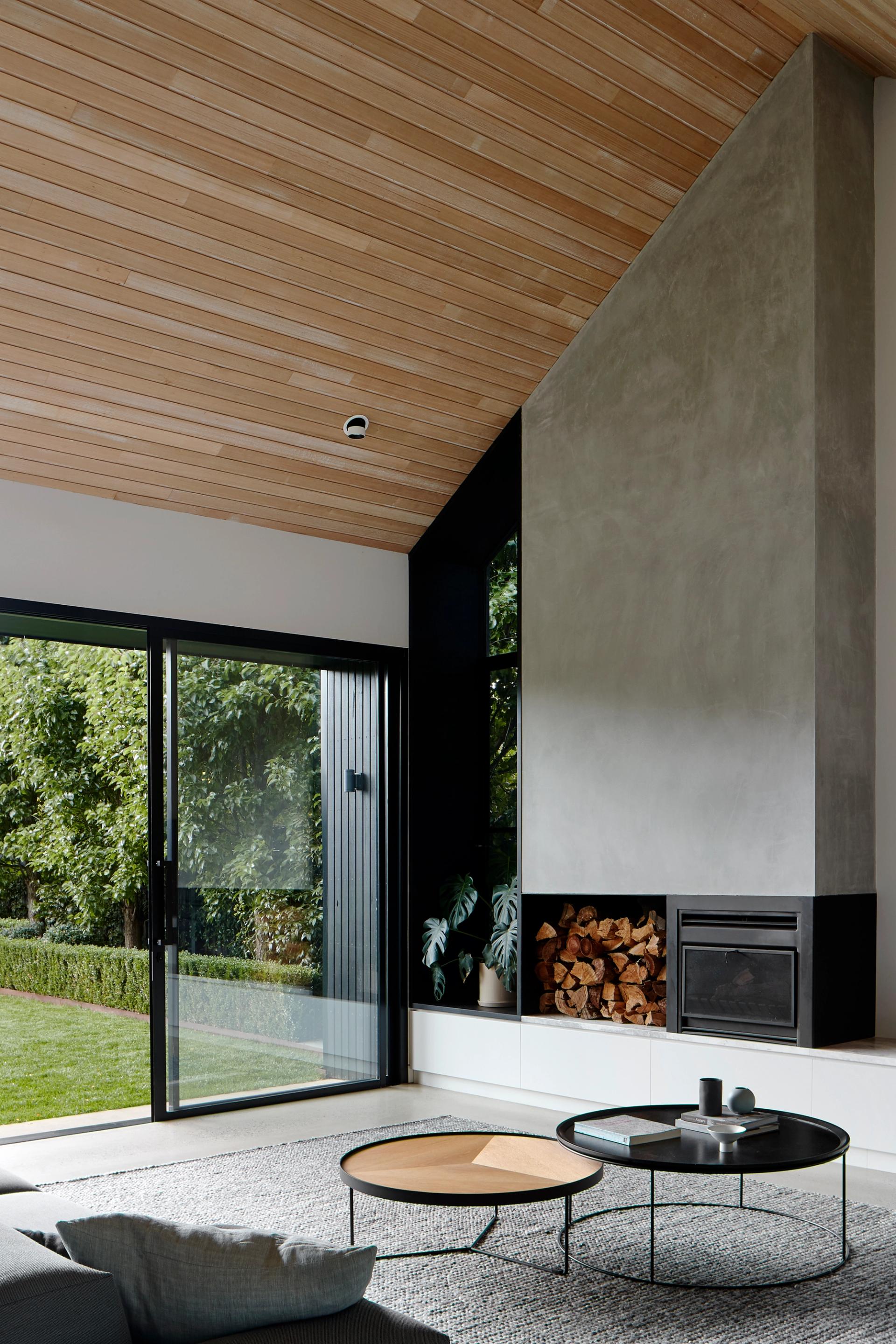 Light pours in from full-width windows that puts the garden permanently on show