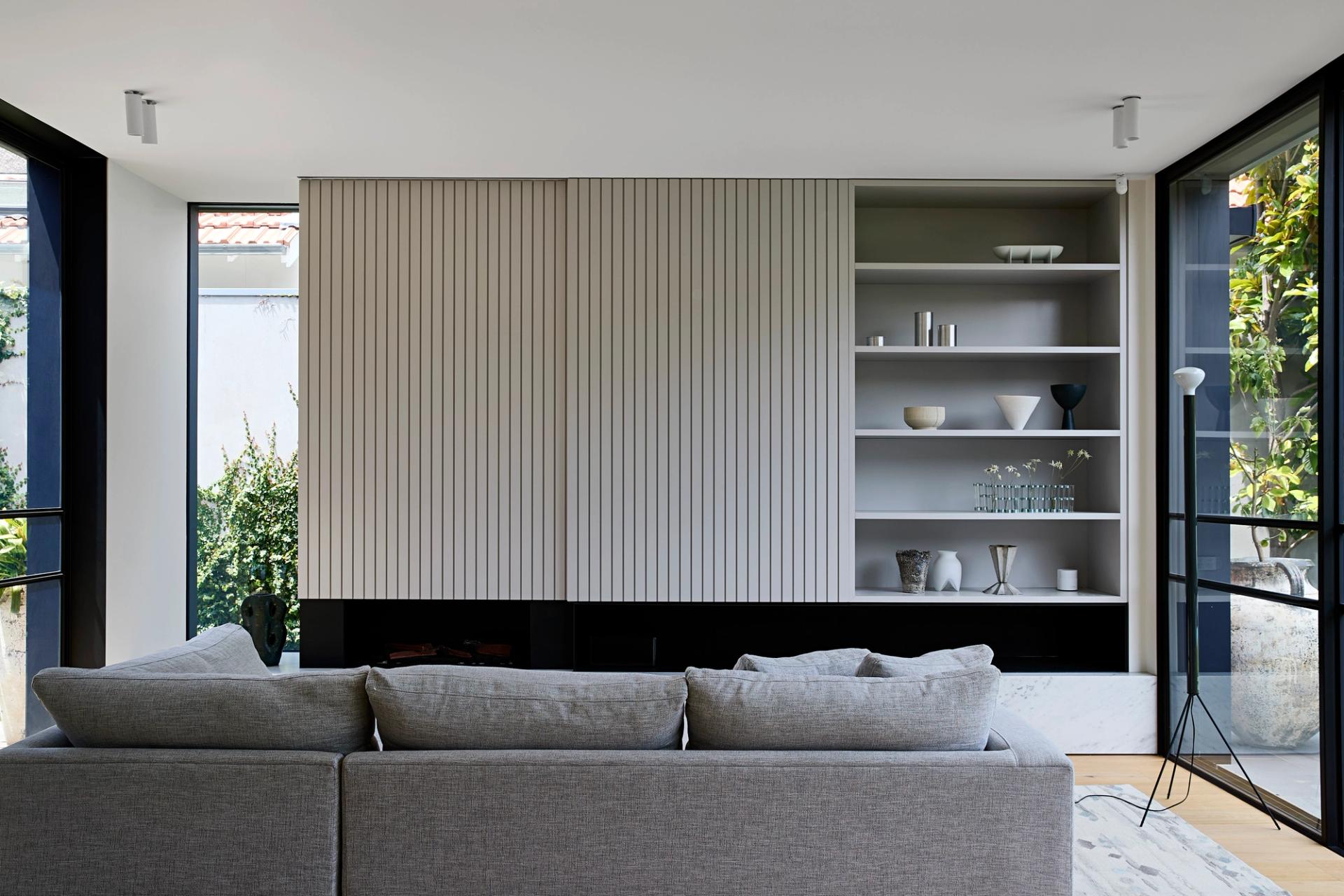 Grey cabinetry is a refined option that reinforces the architectural language throughout the home.