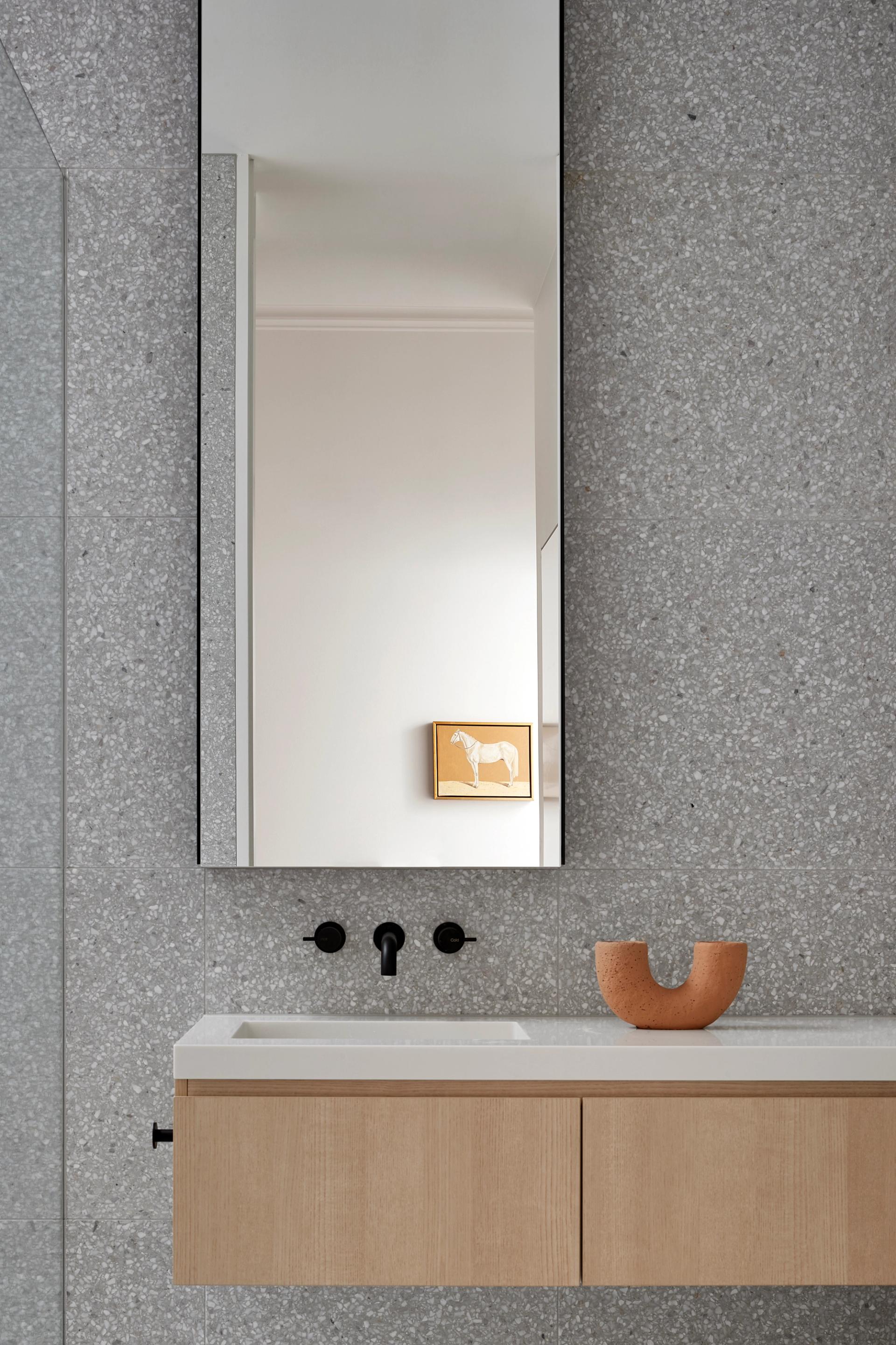 Robust and earthy materiality was integral to the renovation of the Clifton Hill Courtyard House.