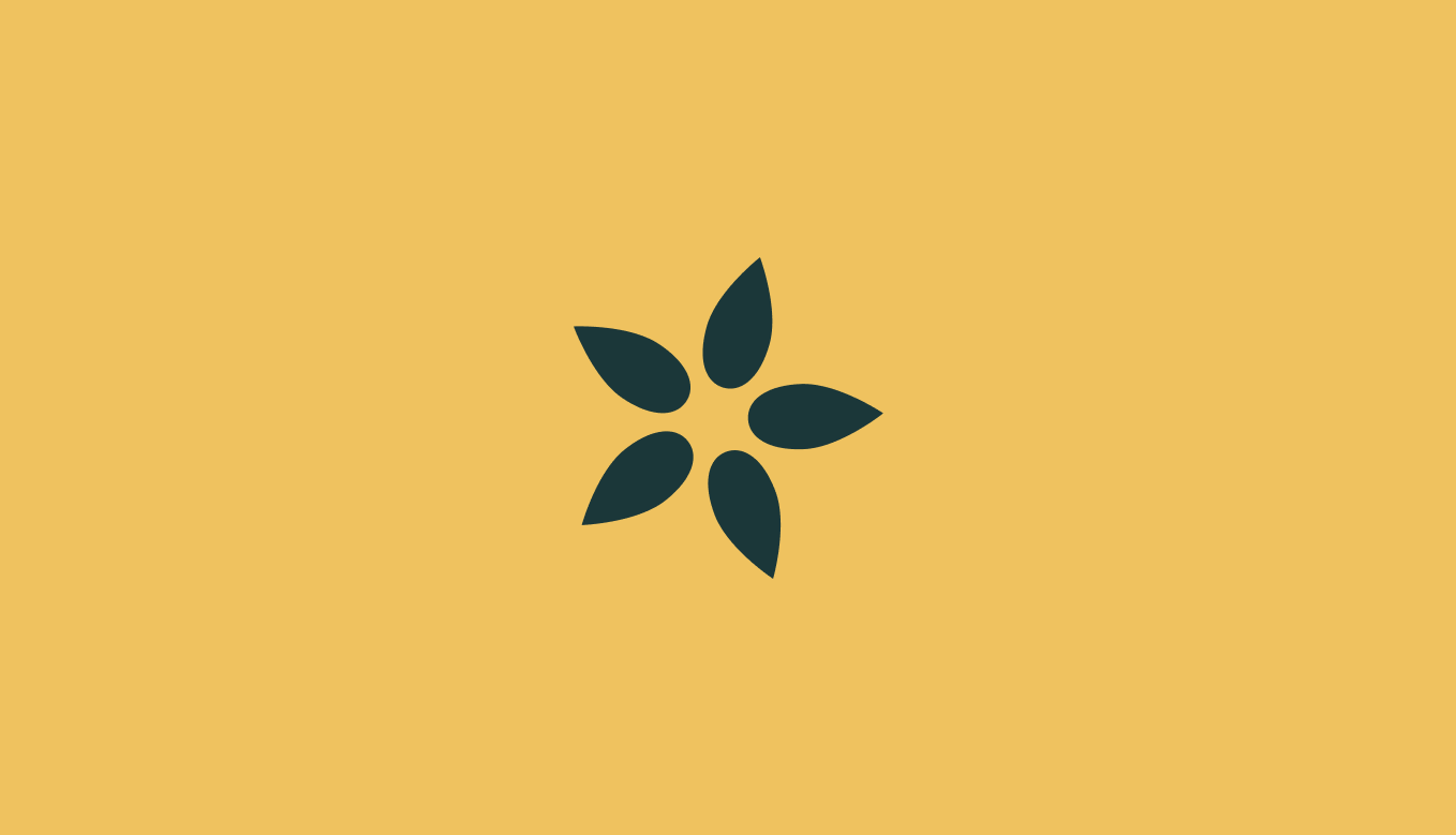 dark green appleseed logo on yellow background