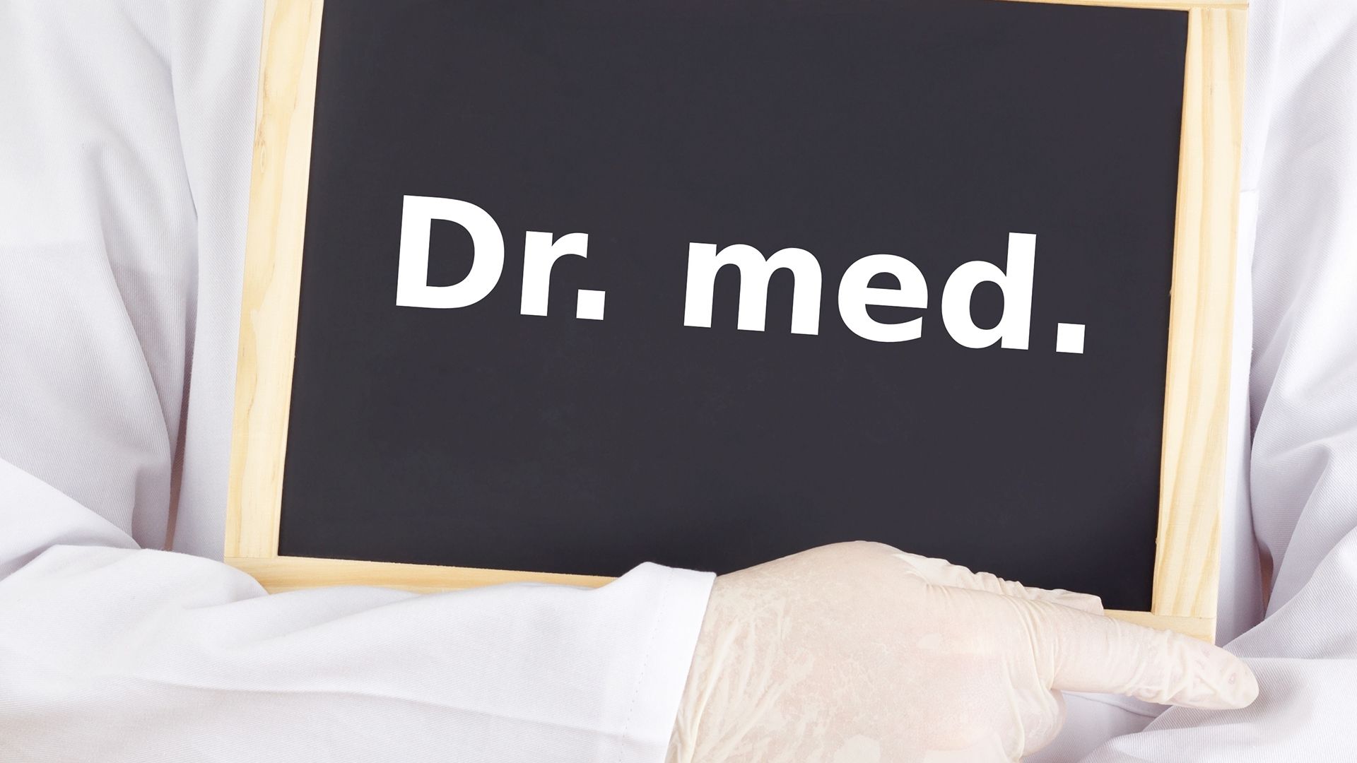 Dr. med. auf ein Schild geschrieben