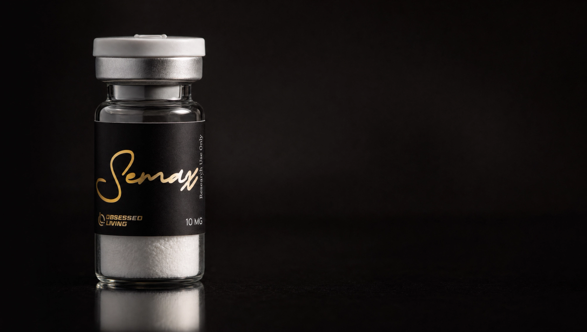 Research vial of Semax with the Obsessed Living label on a dark reflective surface — research-use-only laboratory aesthetic