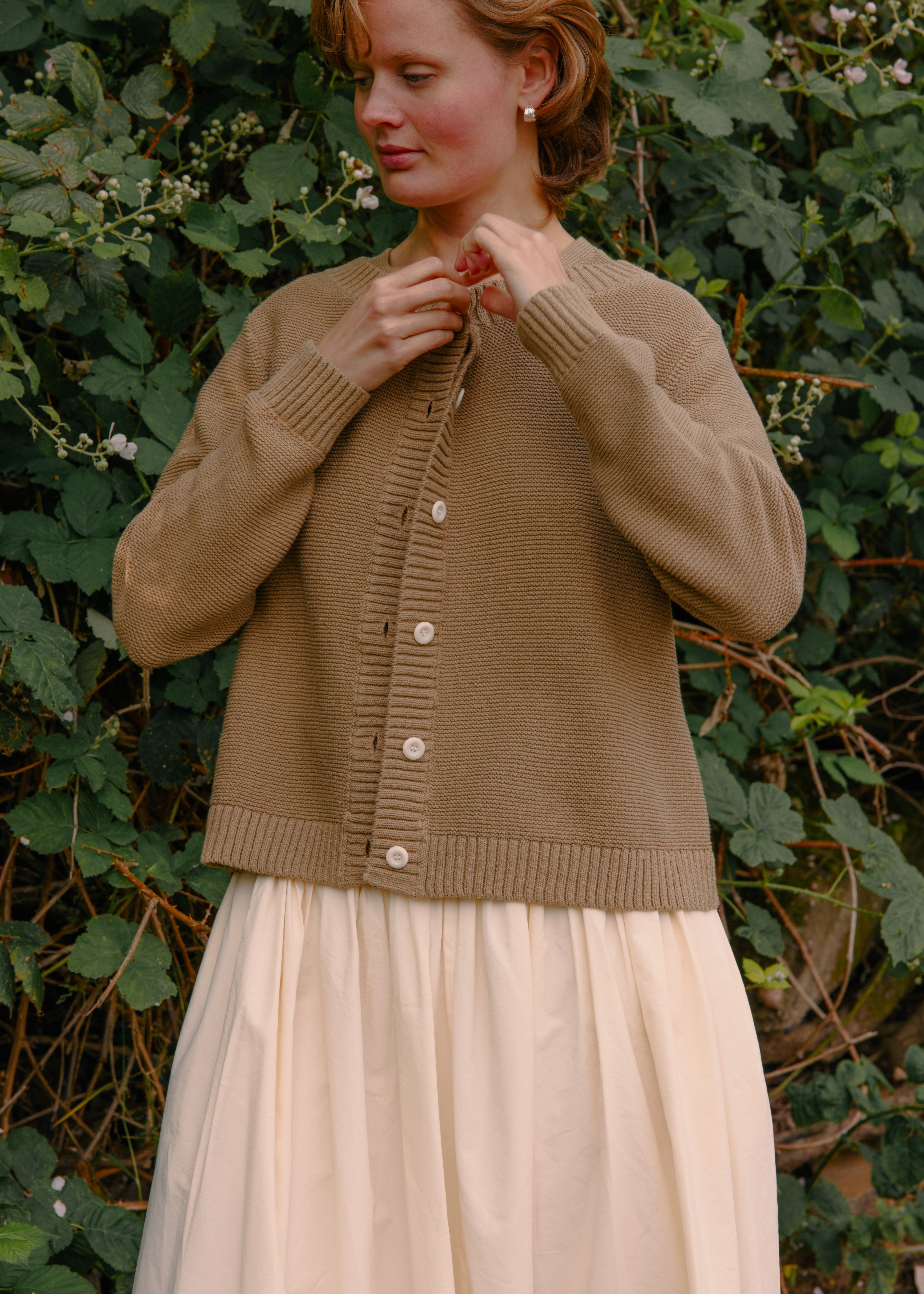 ABOVE, S-T-H Boathouse Cardigan made in a yarn spun from BCI Cotton & Silk to keep you cosy without the heat of wool