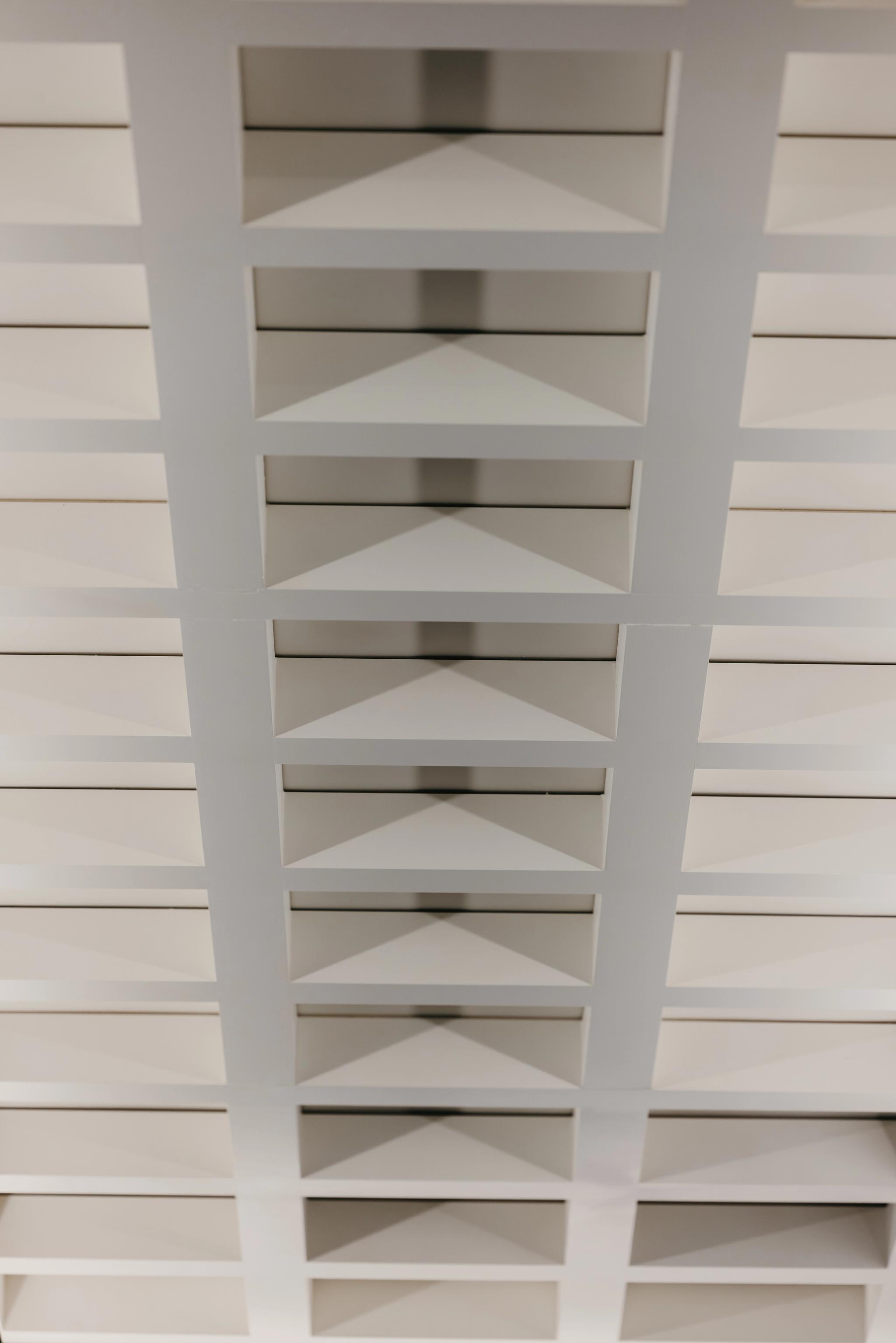 A white staircase beckons upward