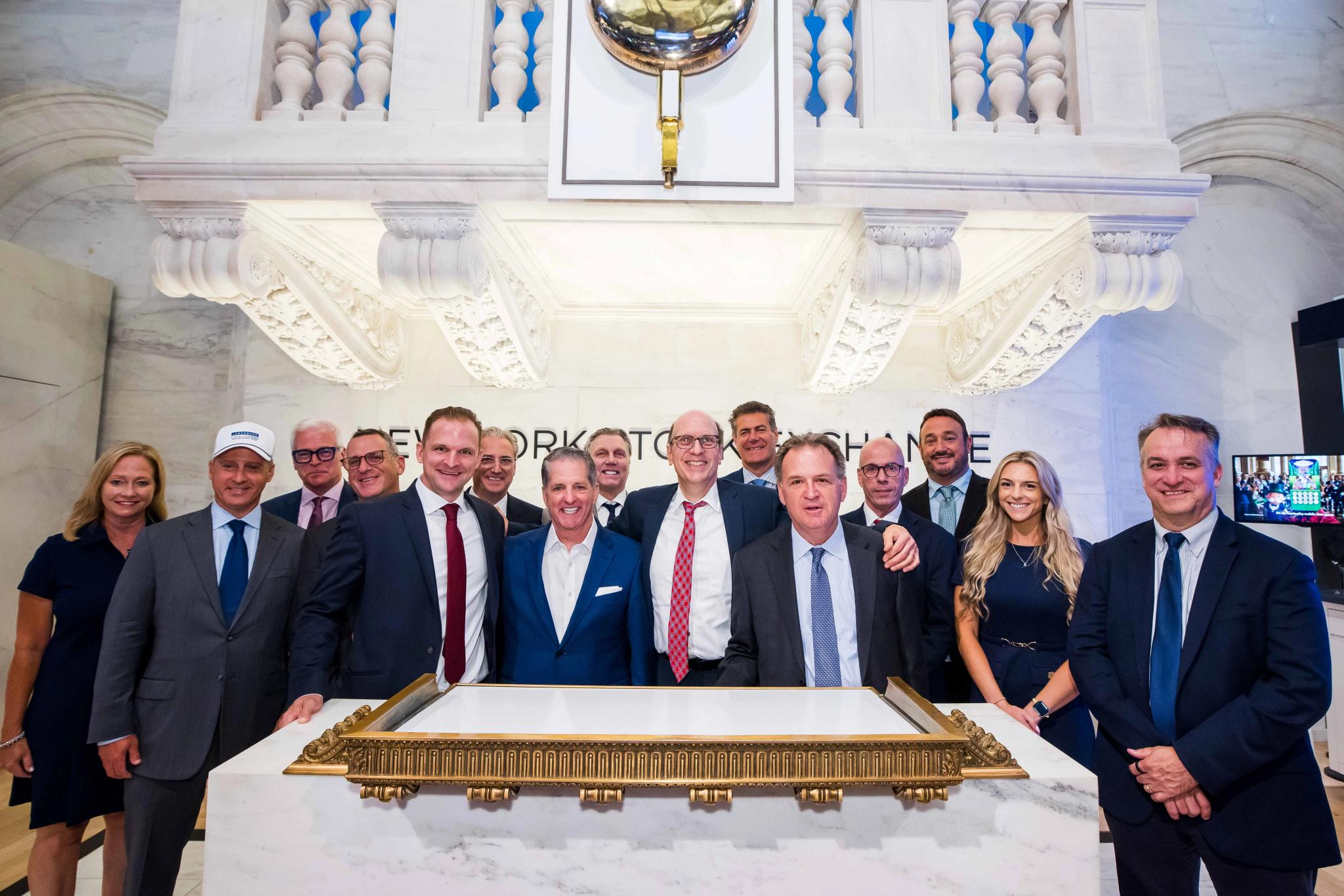 The Ladenburg Thalmann team celebrates their 150th anniversary by ringing the NYSE Closing Bell