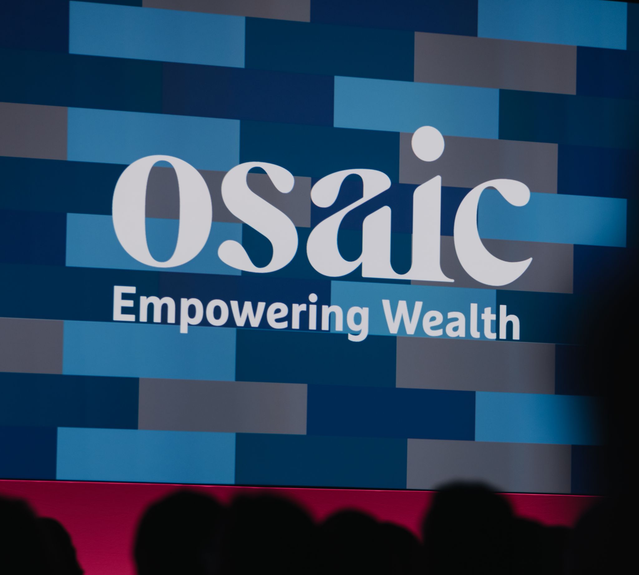 Sign reads, Osaic Empowering Wealth