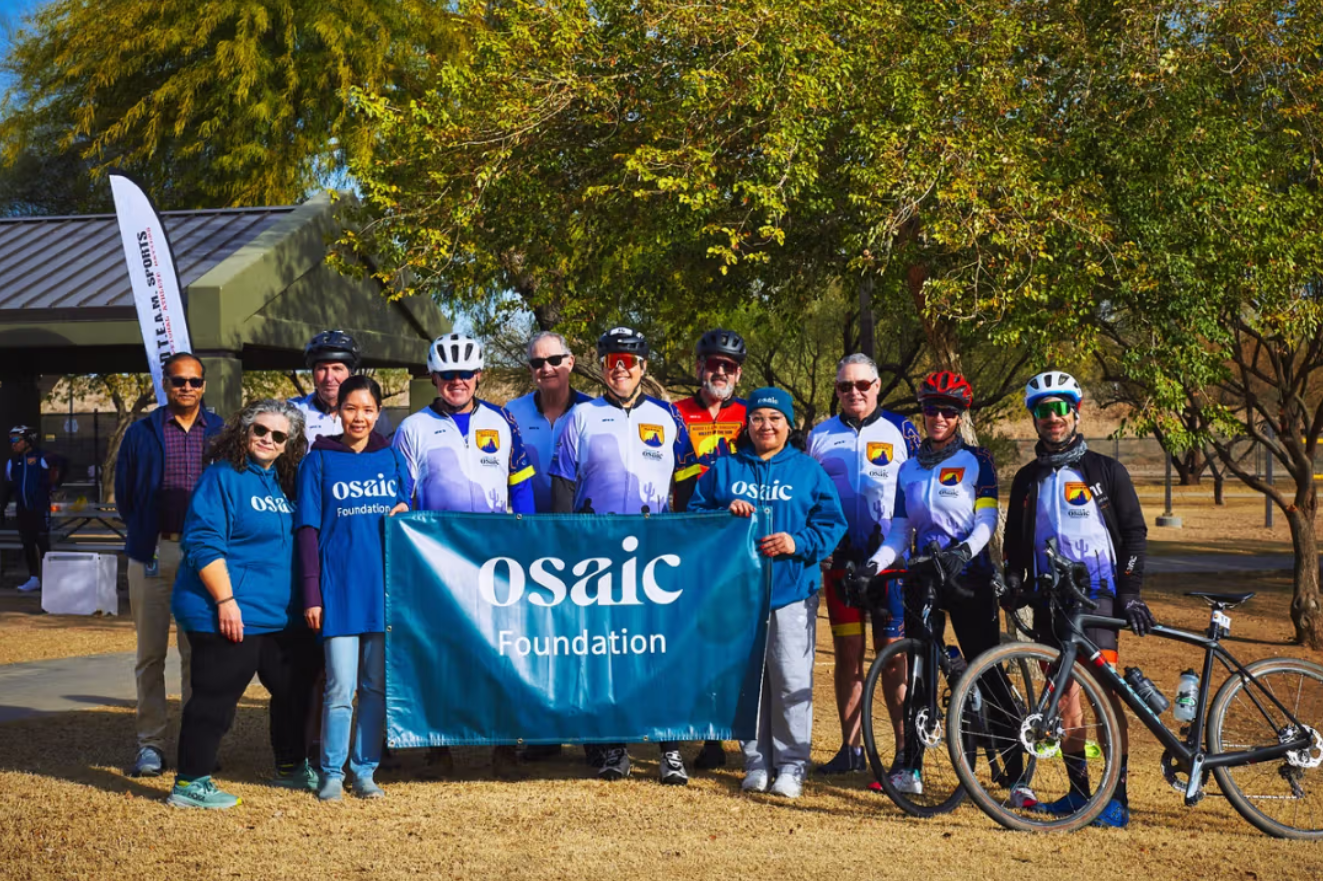 The Osaic Foundation cycling team and event volunteers (2025)
