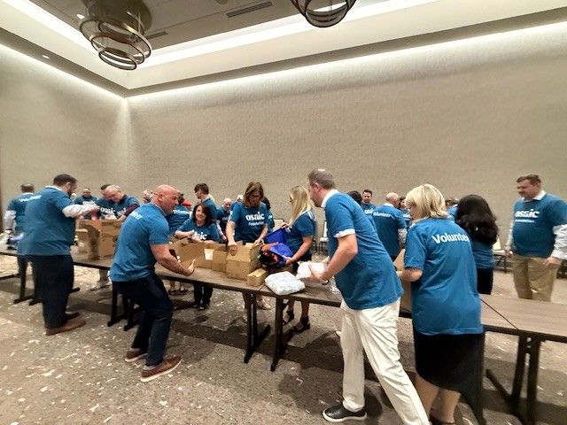 Advisor Engagement Team packs boxes
