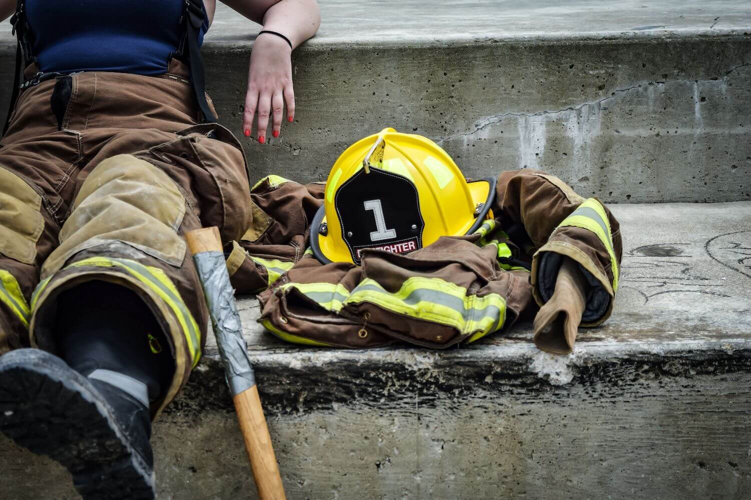 Firefighter resting after putting out fire