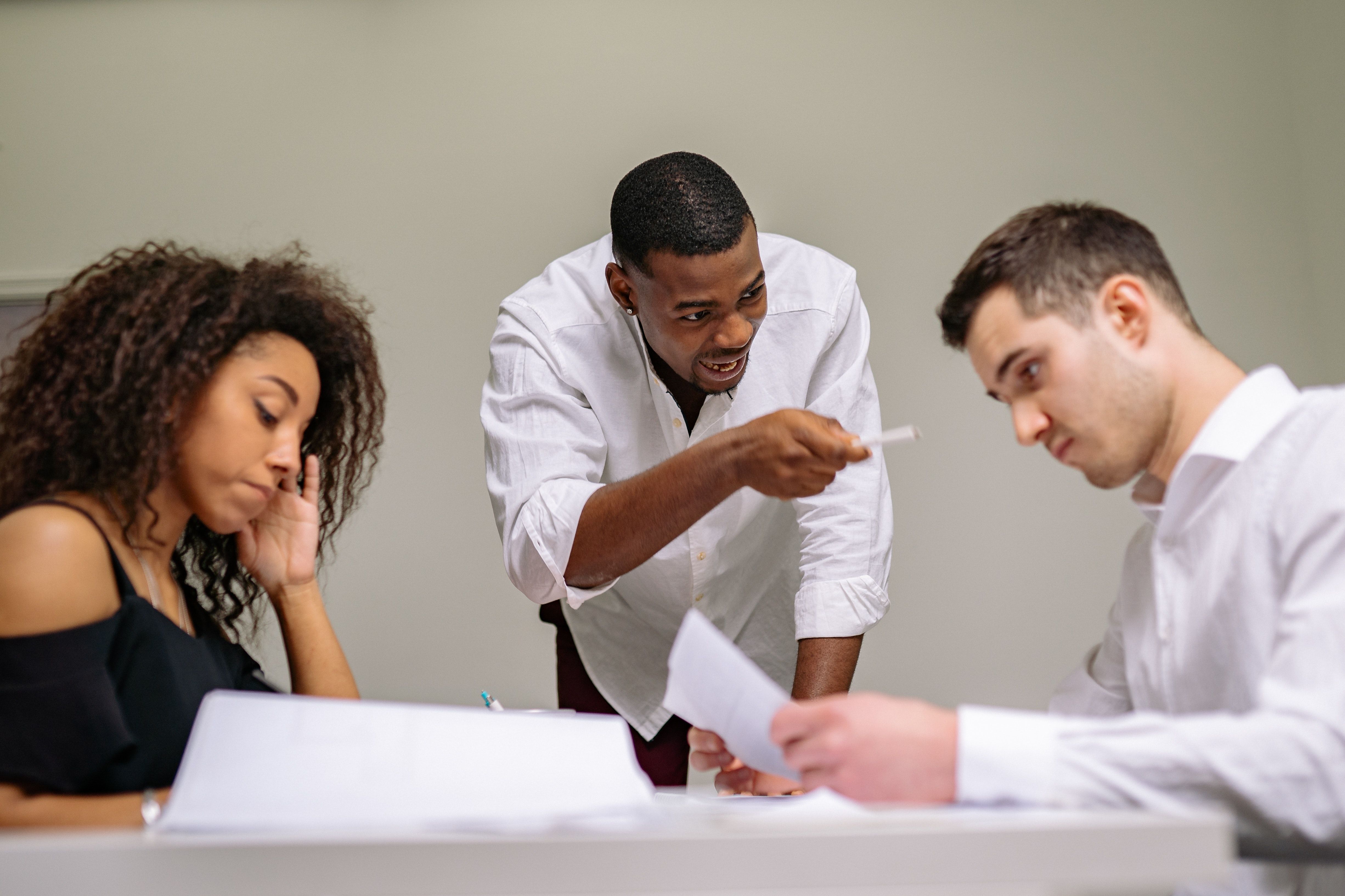 Employees arguing over the companies bankrupty