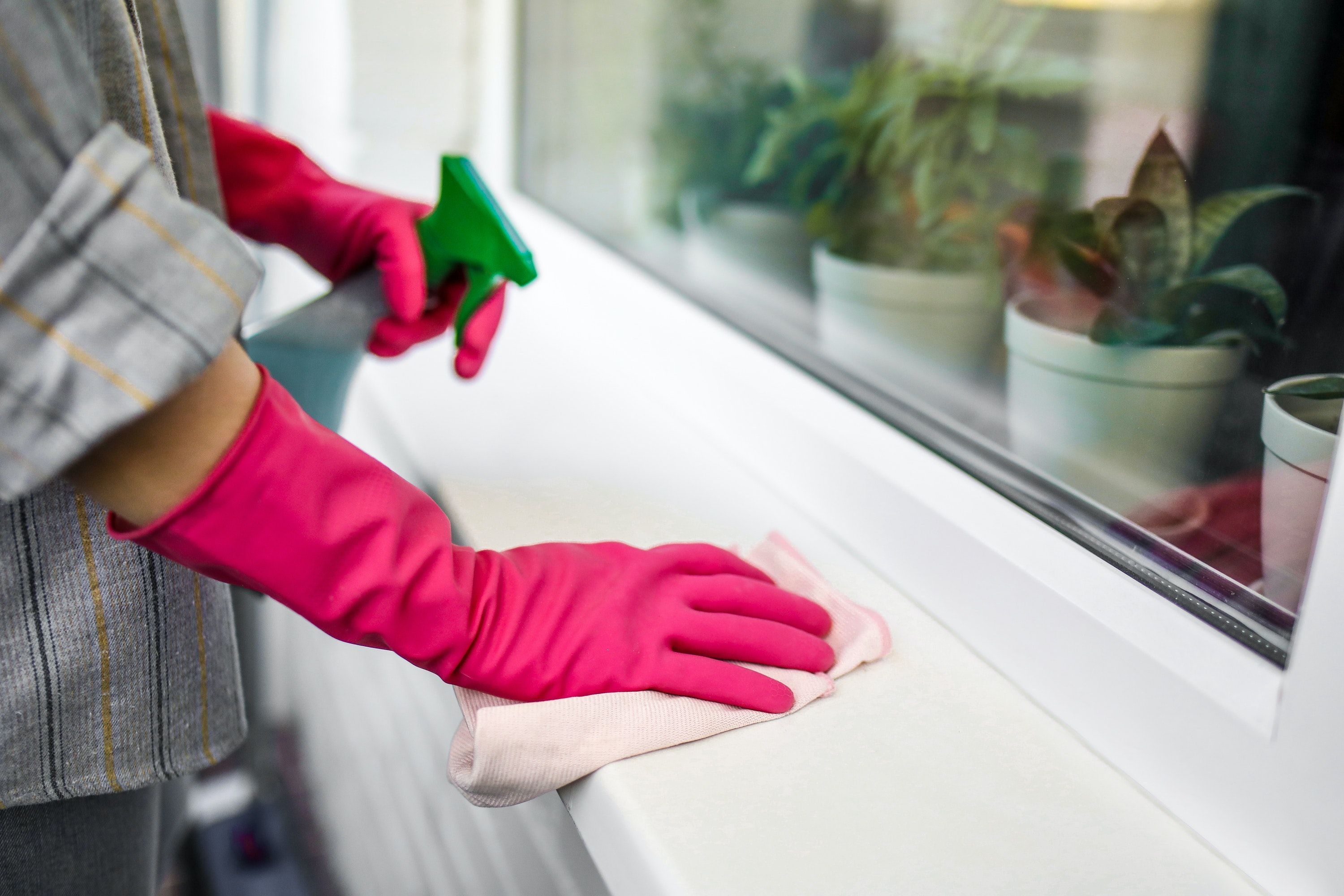 Close Up Of Cleaning A Window