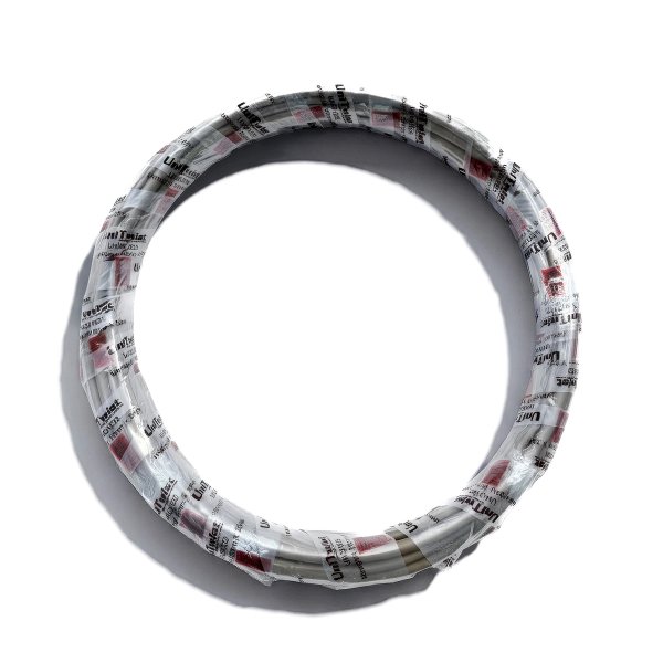 Coiled Unitwist Monogold PP-R pipe wrapped in branded packaging, designed for reliable hot and cold water plumbing systems.