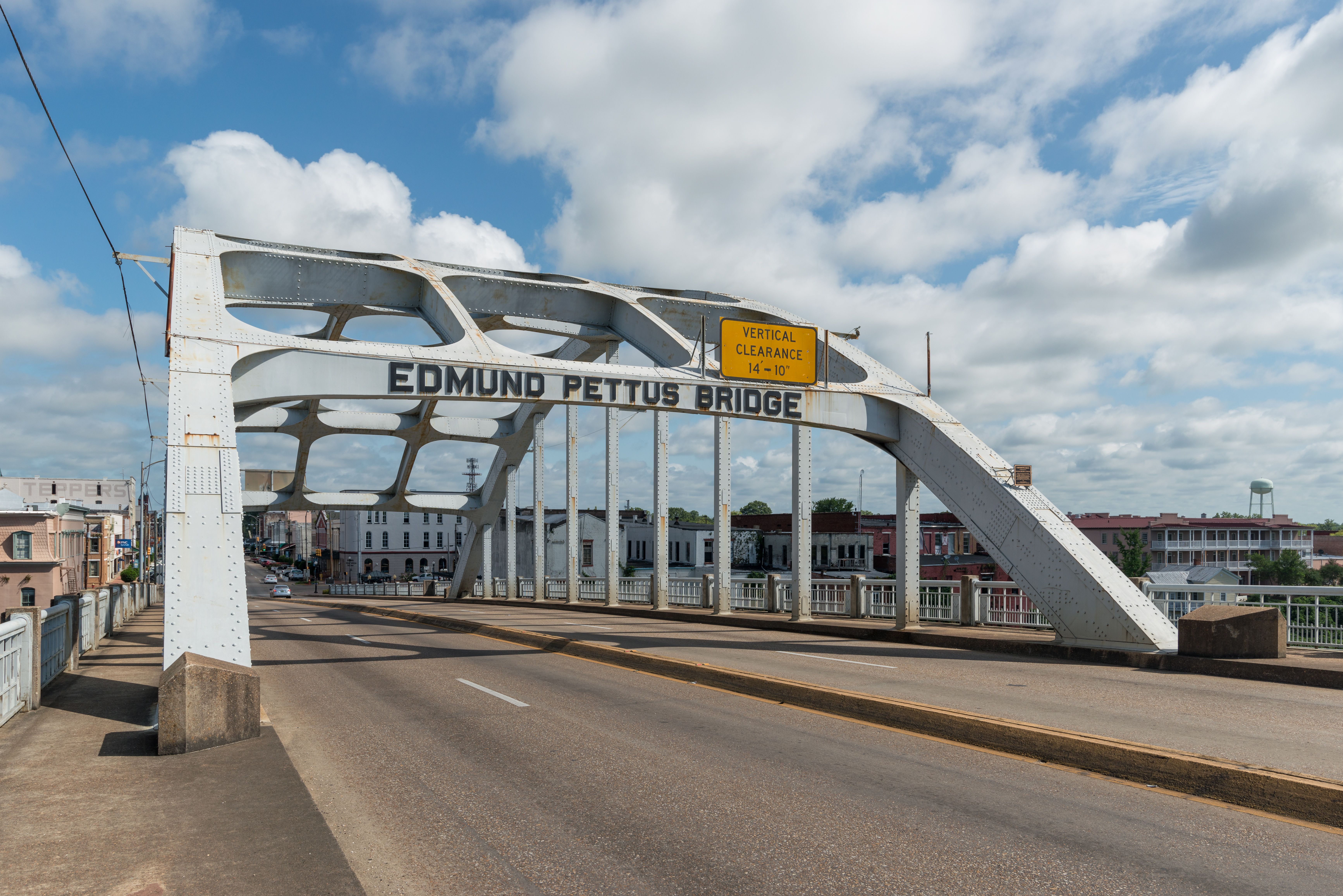 A view of the steel arch and name plate of the Edmund Pettus Bridge.