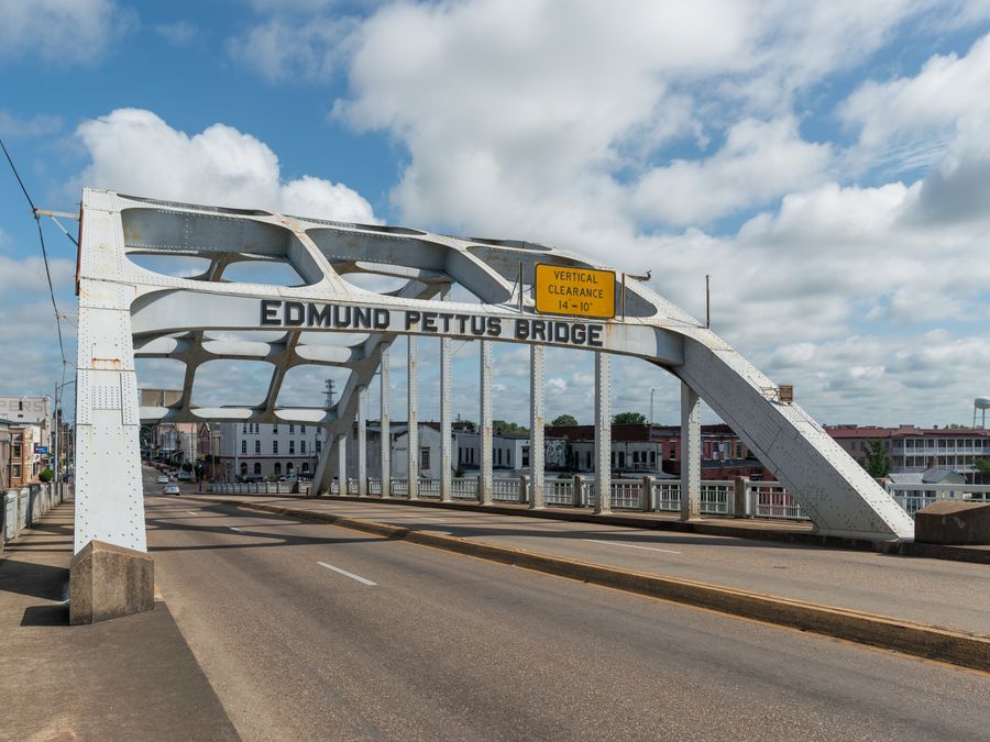 A view of the steel arch and name plate of the Edmund Pettus Bridge.