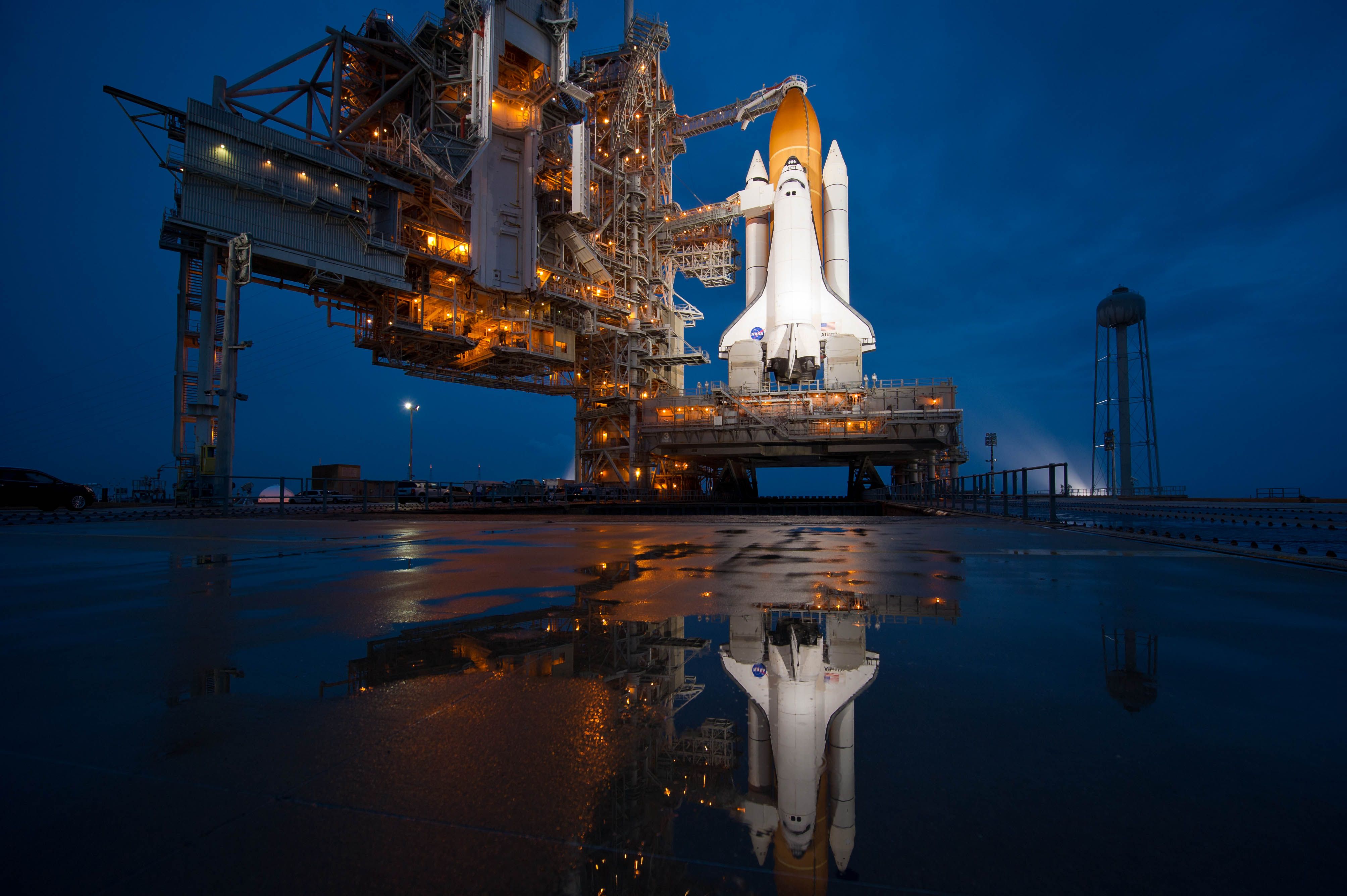 The Space Shuttle Atlantis illuminated on Launch Pad 39A before the final shuttle mission.