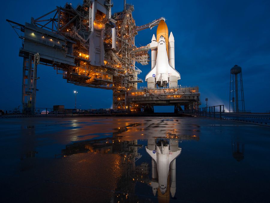 The Space Shuttle Atlantis illuminated on Launch Pad 39A before the final shuttle mission.