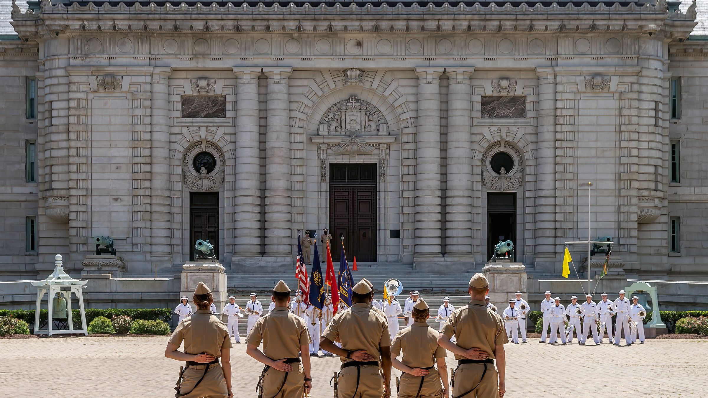 Midshipmen in noon formation outside Bancroft Hall at the Naval Academy.