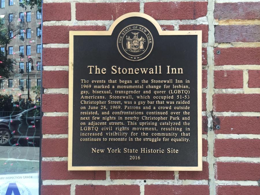 A commemorative plaque marking the Stonewall Inn's role in LGBTQ+ history.
