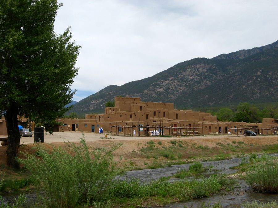 Taos Pueblo beside the Rio Pueblo stream.