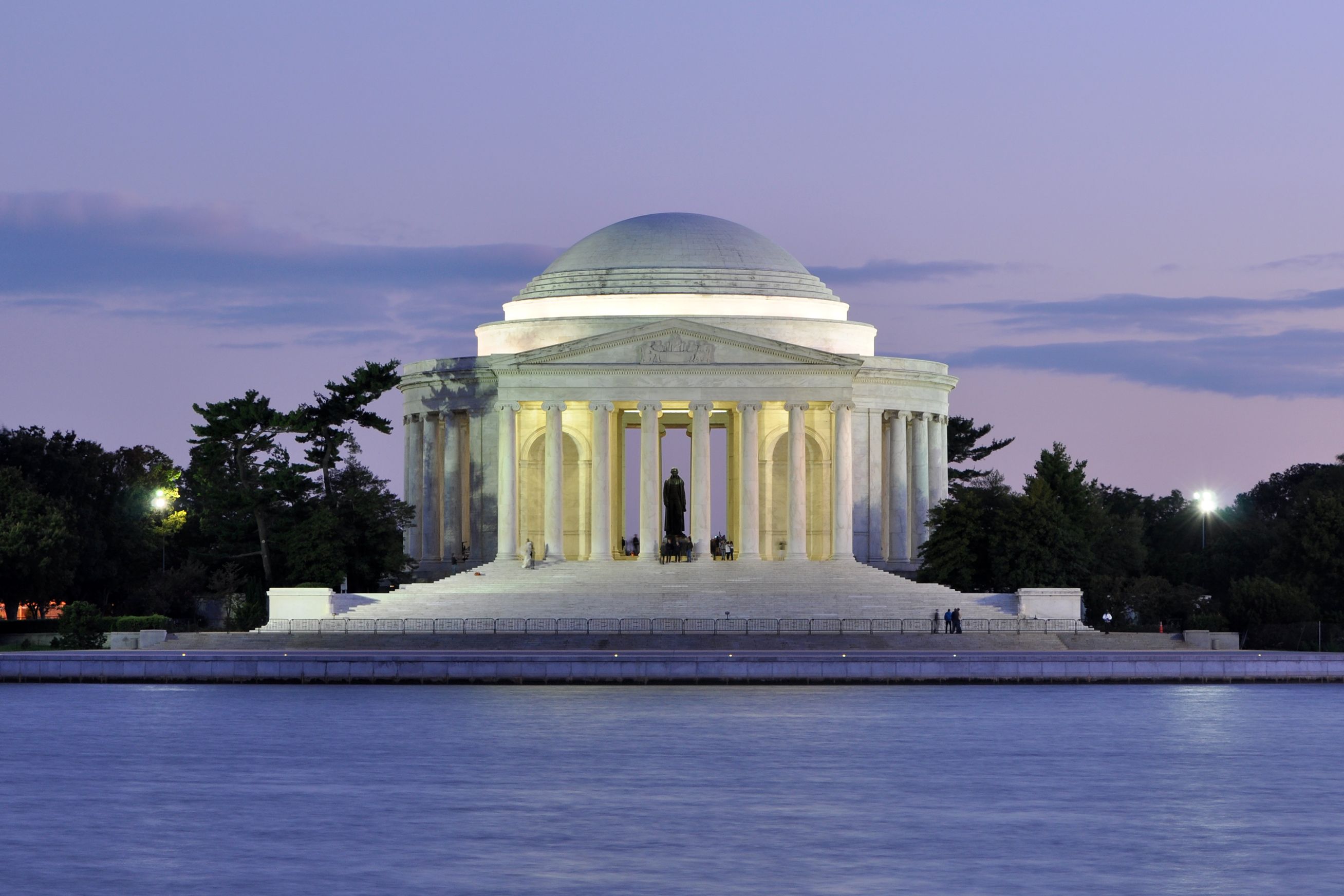 The Jefferson Memorial illuminated at dusk.