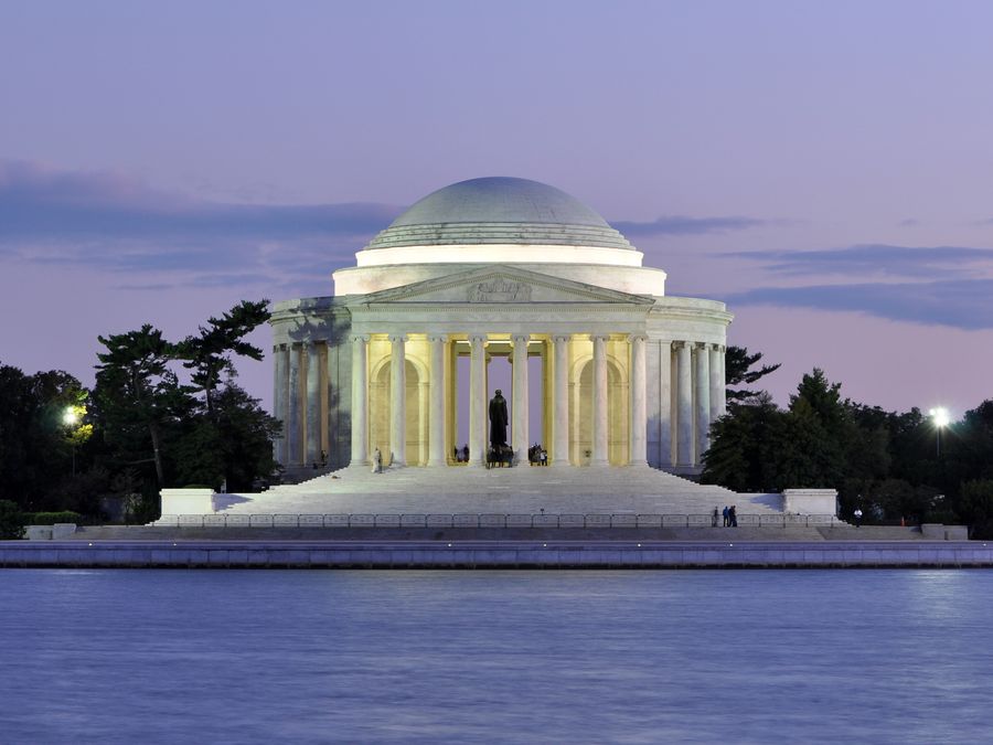 The Jefferson Memorial illuminated at dusk.